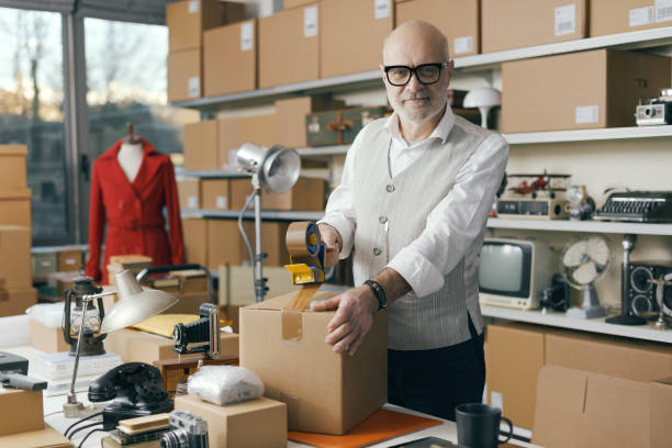 istock Business owner preparing a delivery box 2166033127