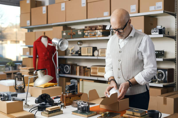 istock Seller packing items and preparing a shipment 2166033210
