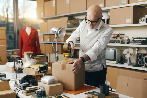istock Business owner preparing a delivery box 2166033808
