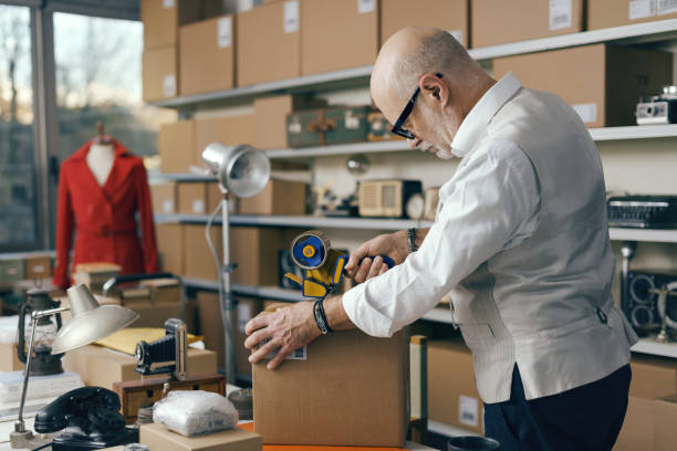 istock Business owner preparing a delivery box 2166034705