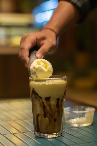 istock Put ice cream into a glass to make float drink 2166036838