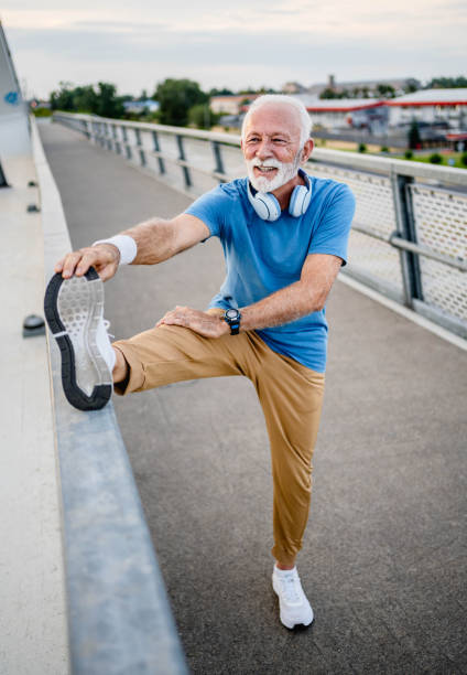 istock Senior man exercising outdoors 2166037037