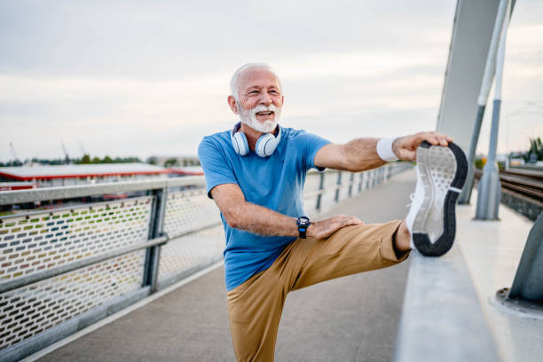 istock Senior man exercising outdoors 2166037077