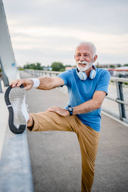 istock Senior man exercising outdoors 2166037089