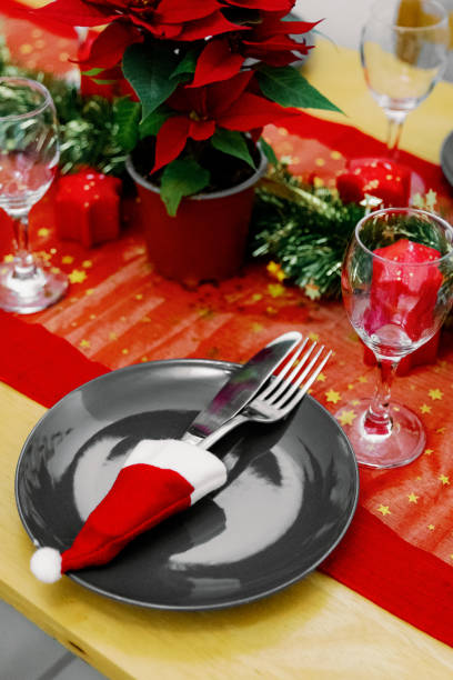 istock A plate with a knife and fork on a beautiful festively served table. 2166037234