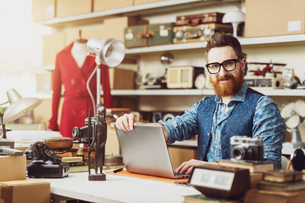 istock Business owner posing with a laptop 2166041250