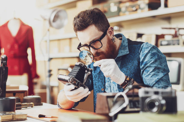 Collector checking vintage items in his store