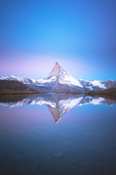 istock Matterhorn peak on Stellisee lake 2166045553