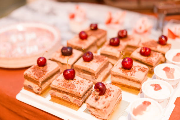 istock Petit fours on a tray made with chocolate and cherries 2166047005