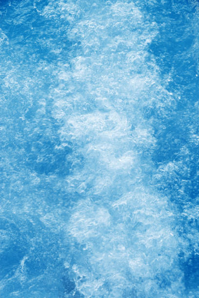 istock Abstract transparent water texture, bubbling clear water as textured background, purity and beauty of nature, natural ripples and waves on blue turquoise aquatic surface, nature environment 2166052555