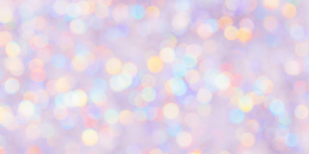 istock Colorful Bokeh Lights as Soft Pastel Background, Abstract bokeh background, natural flare from lights,  blurred round texture as holiday backdrop, celebration fon with optical effect 2166053253