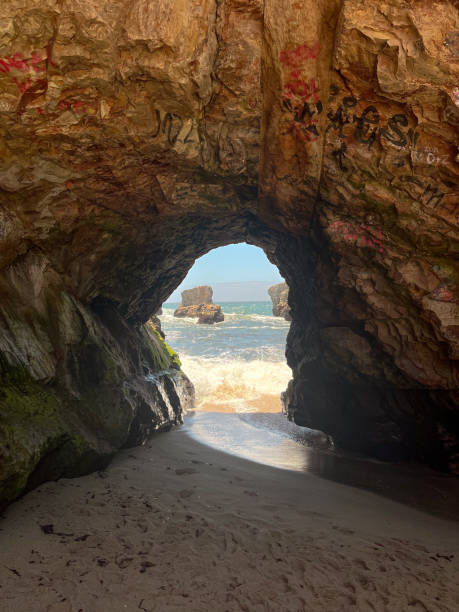 istock Ocean view inside the rock with tunnel, beach cliffs, California 2166057358