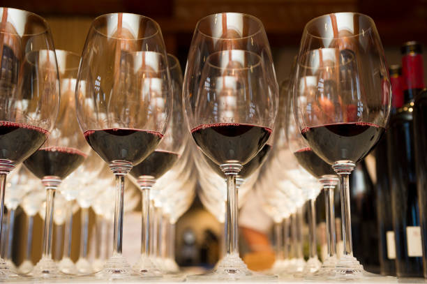 istock Rows of red wine in glasses 2166060326