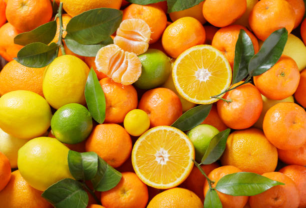 istock Fresh citrus fruits as background, top view 2166060497