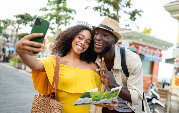 istock Loving couple taking a selfie while traveling 2166065340