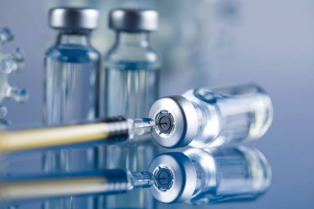 istock Close up medical syringe with a vaccine 2166067888