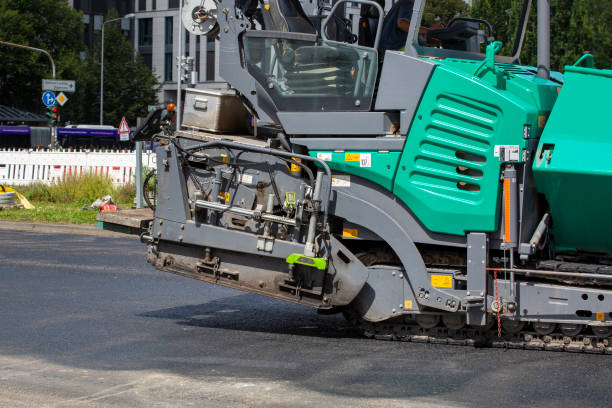 istock Road construction site and asphalt paving machine 2166071152