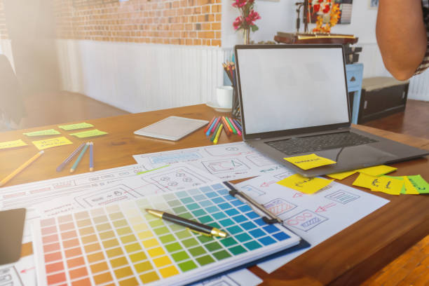 istock Smooth Focus, group of web designers are working together to develop mobile responsive website with UI UX Front End Designer Previewing. website designers in form of mobile applications with UI UX 2166074393