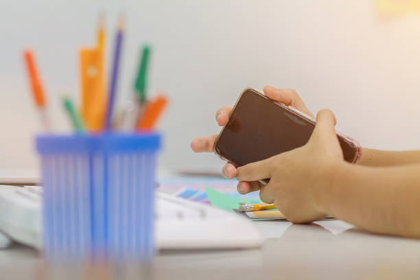 istock Smooth Focus, group of web designers are working together to develop mobile responsive website with UI UX Front End Designer Previewing. website designers in form of mobile applications with UI UX 2166074660