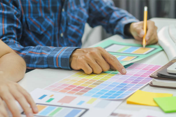 istock Smooth Focus, group of web designers are working together to develop mobile responsive website with UI UX Front End Designer Previewing. website designers in form of mobile applications with UI UX 2166074696