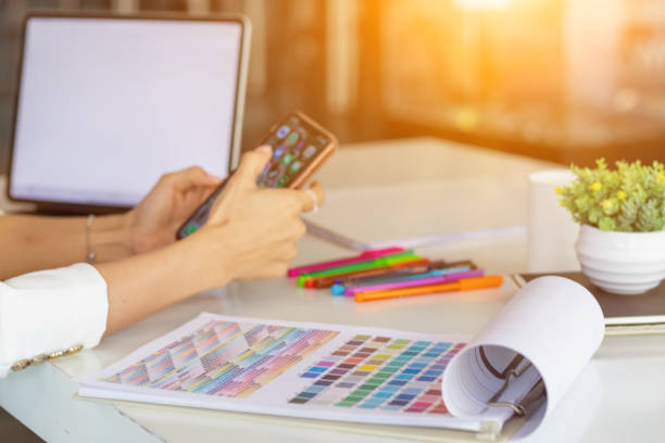 istock Smooth Focus, group of web designers are working together to develop mobile responsive website with UI UX Front End Designer Previewing. website designers in form of mobile applications with UI UX 2166074906