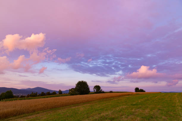 Mountain landscape. View of the colorful sky with clouds during a beautiful summer sunset