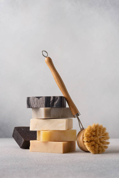 istock Stack of handcrafted soap bars and bamboo dish brush. 2166085146