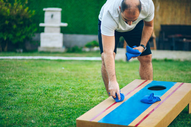 istock Playing bean bag toss in the backyard 2166086169