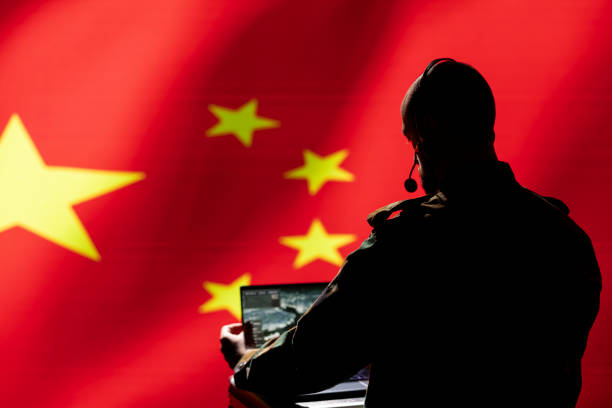 istock Chinese soldier in command control room using military tech to identify threats 2166090605