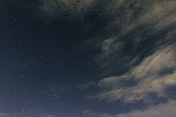 Free Stock Photo of Night Sky Filled With Stars and Clouds | Download