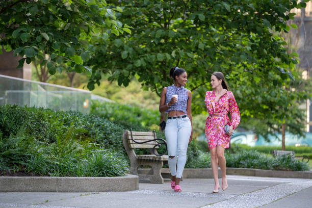istock Young women walk on paved pathway, Vancouver 2166098271