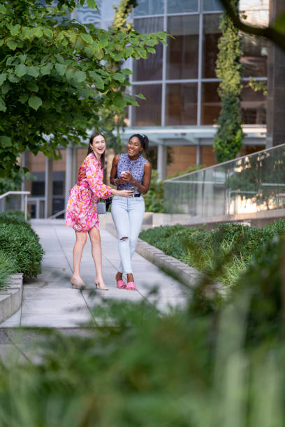 istock Young women walk on paved pathway, Vancouver 2166098357