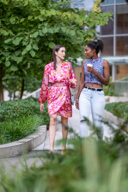 istock Young women walk on paved pathway, Vancouver 2166098438