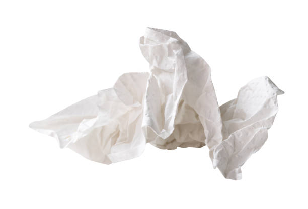 istock White crumpled tissue paper ball in strange shape after use isolated on white background with clipping path 2166099155