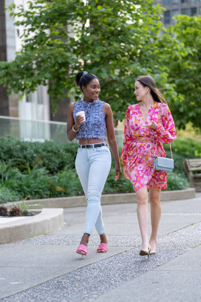 istock Young women walk on paved pathway, Vancouver 2166099165