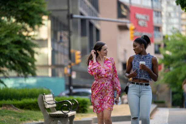 istock Young women walk on paved pathway, Vancouver 2166099425
