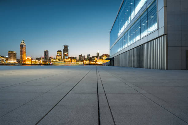 Empty floor and city building at night.