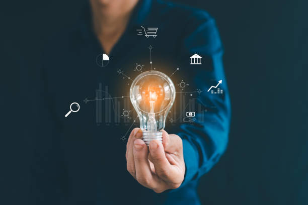 istock man holding a light bulb Represents business ideas, growth, expansion 2166122596
