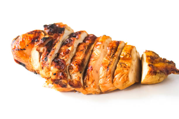 istock Sliced ​​grilled chicken breast on a white background 2166128429