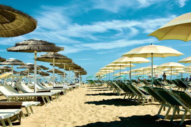 istock Rows of beach umbrellas 2166128932