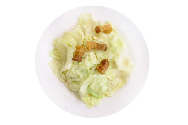 Die cut of Stir-fried cabbage with fish sauce on white isolated