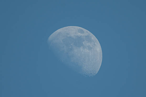 istock Looking up, you can see the daytime moon 2166135808