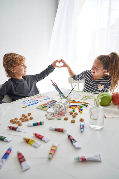 istock Positive children showing heart gesture 2166135819