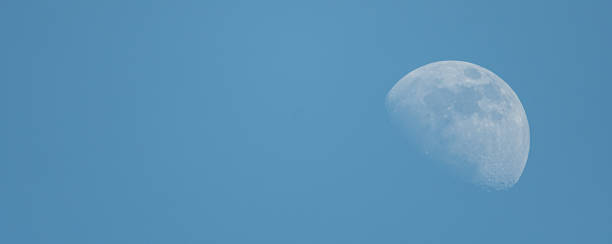 istock Looking up, you can see the daytime moon 2166135871