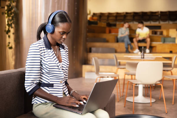 istock Busineswoman working in a co-working office 2166136102