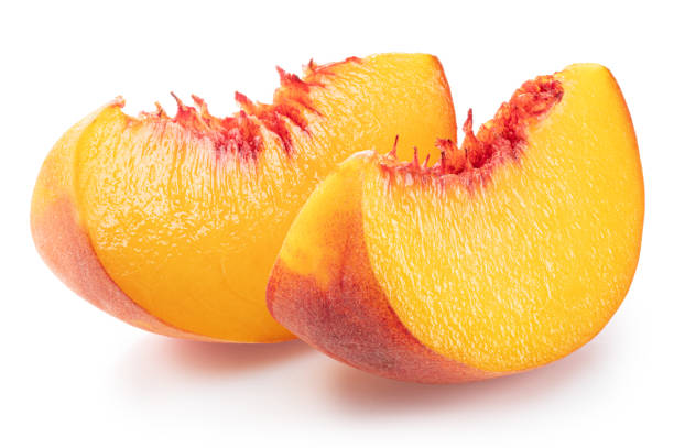 istock Ripe peach slices on white background. File contains clipping path. 2166148555