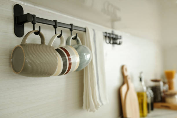 istock Cups Hanging In Order In The Kitchen 2166150412