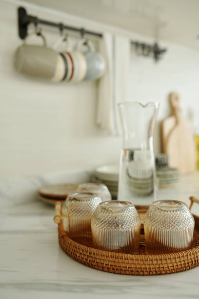 istock Wicker Tray With Clean Glasses 2166150528