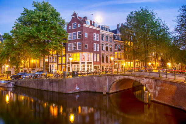 istock Houses and bridge in Amsterdam 2166152576