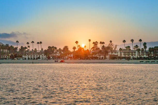 istock scenic beach with palm trees in Santa Barbara in sunset 2166152817